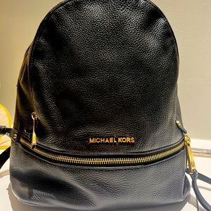 Black Micheal Kors Leather backpack purse